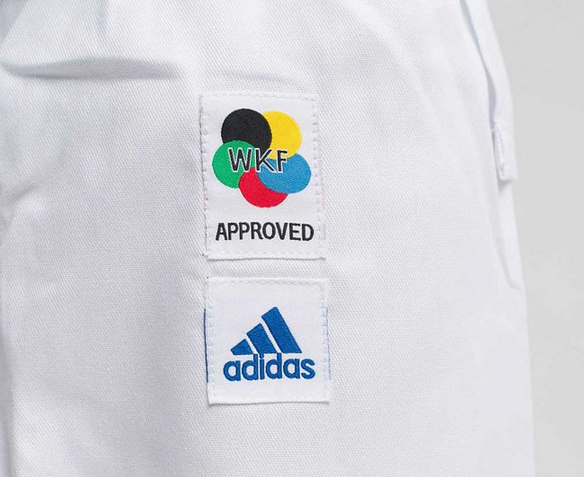 Кимоно для карате подростковое Adidas Evolution WKF K200E белый 2000_1634